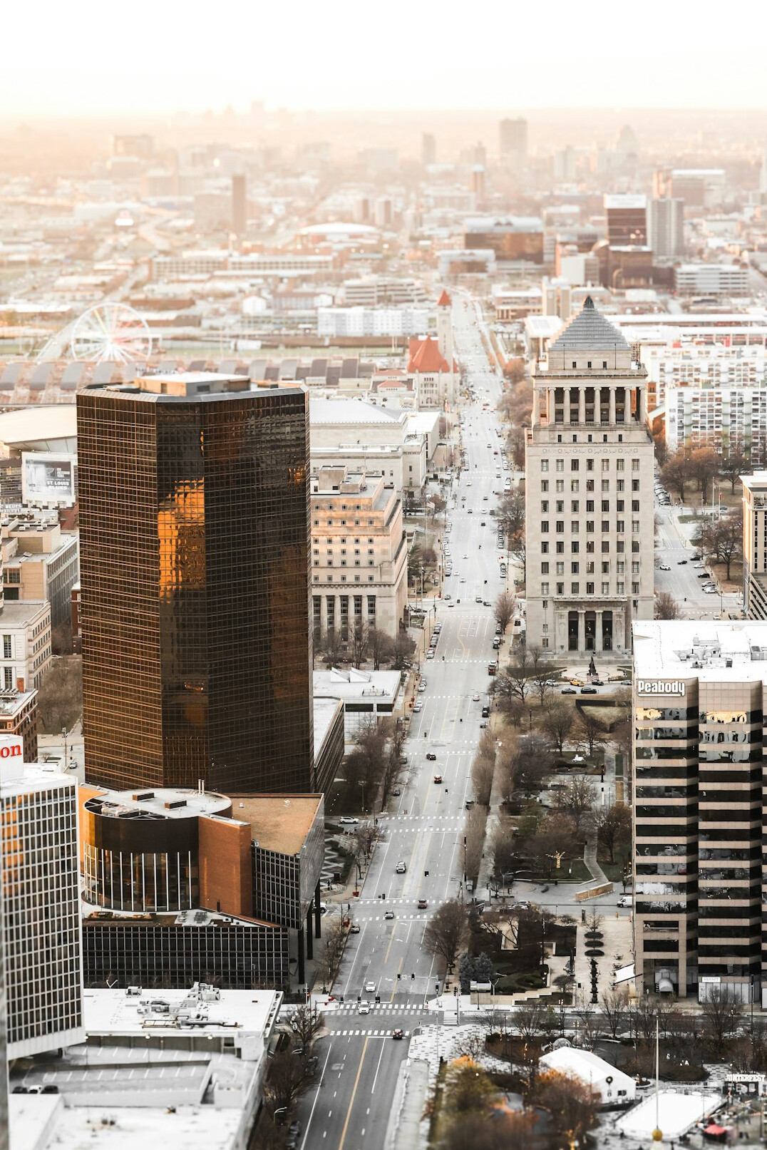Aerial view of a city skyline with streets and buildings