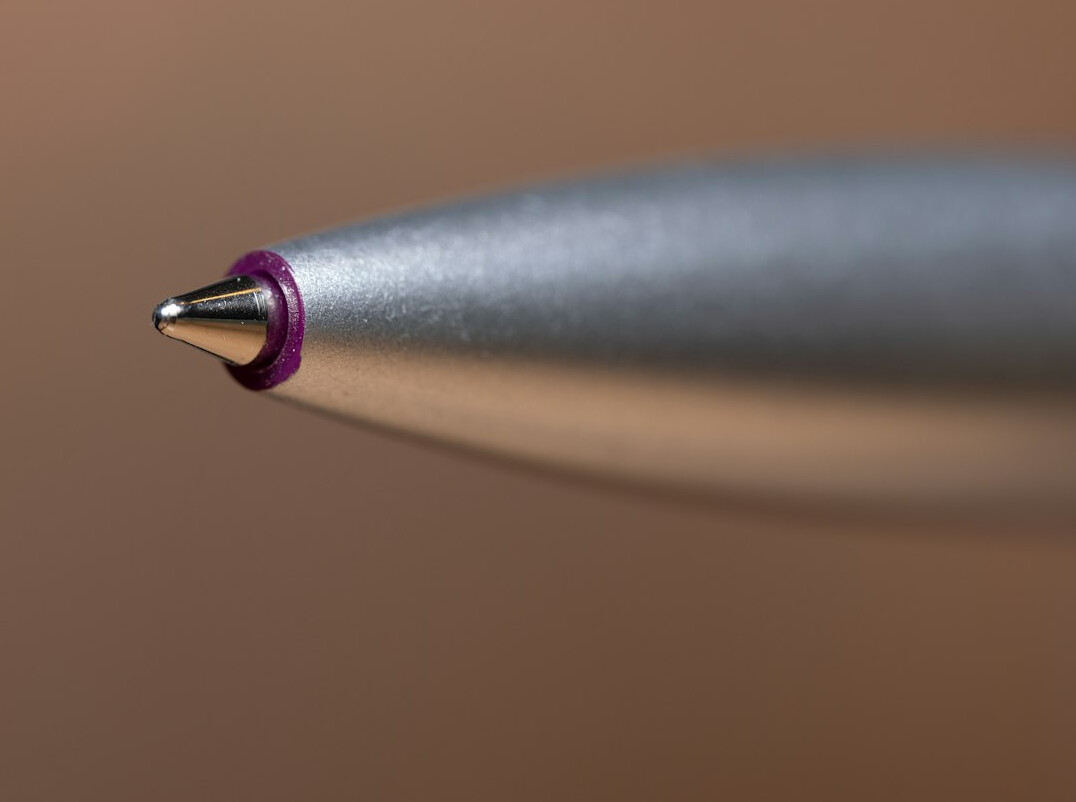 Documents and a pen on a desk for research