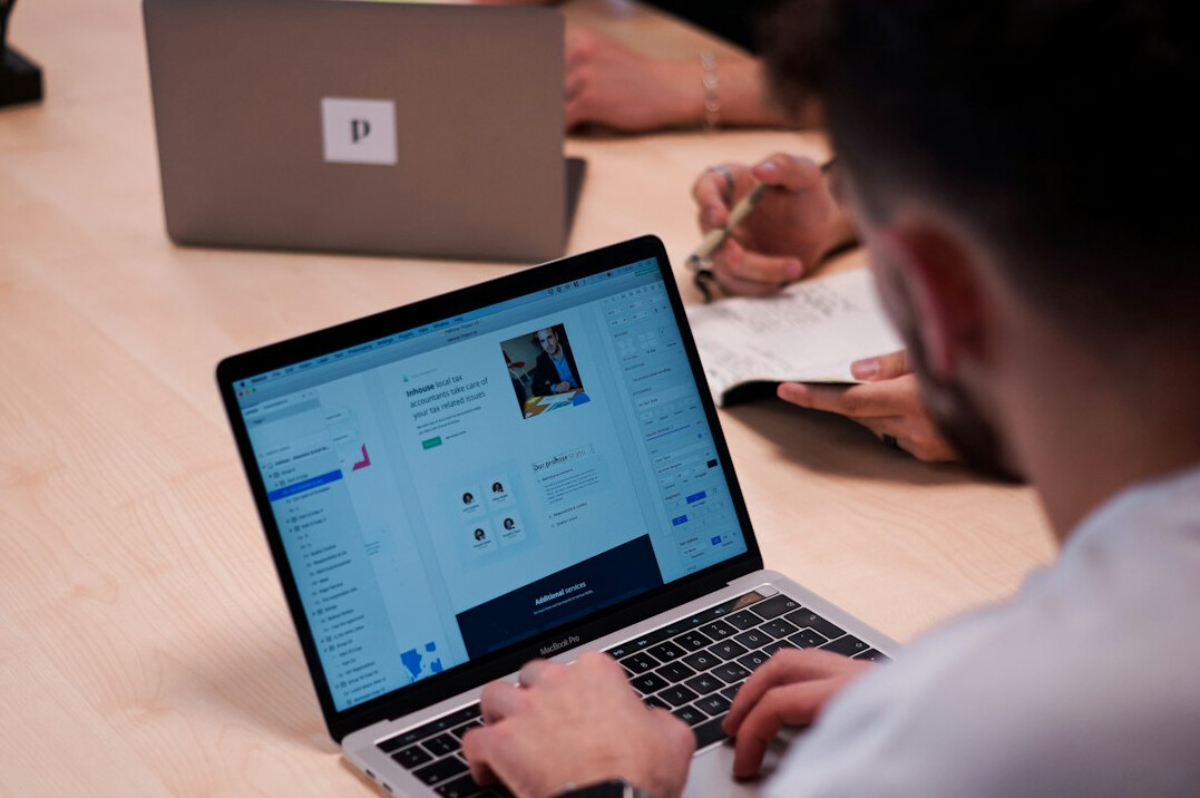 social media analyst reviewing profiles